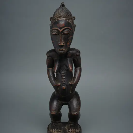 A Baule wooden female figure - Ivory Coast – Africa,